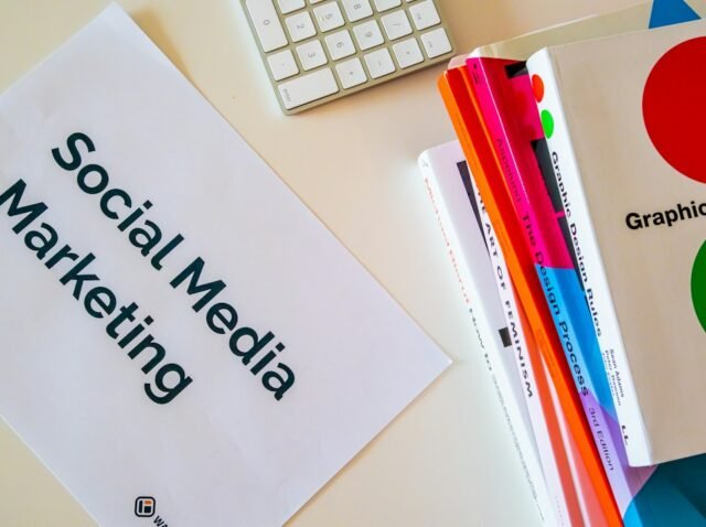 Clinic manager and marketing team reviewing a social media content calendar in a modern clinic office